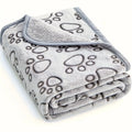 Manta acogedora para gatos con estampado de huellas